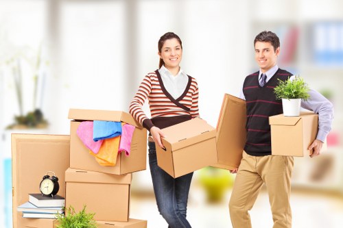 Preparing labeled office boxes and workstations for a Docklands business relocation
