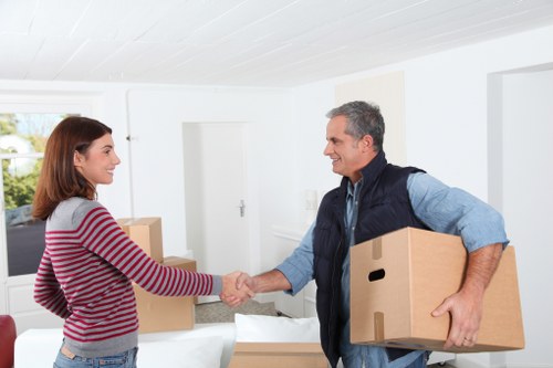 Local team handling boxes and furniture in Docklands