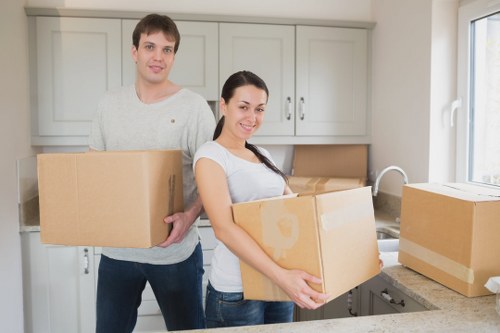 Packing boxes and furniture for a flat move in Docklands
